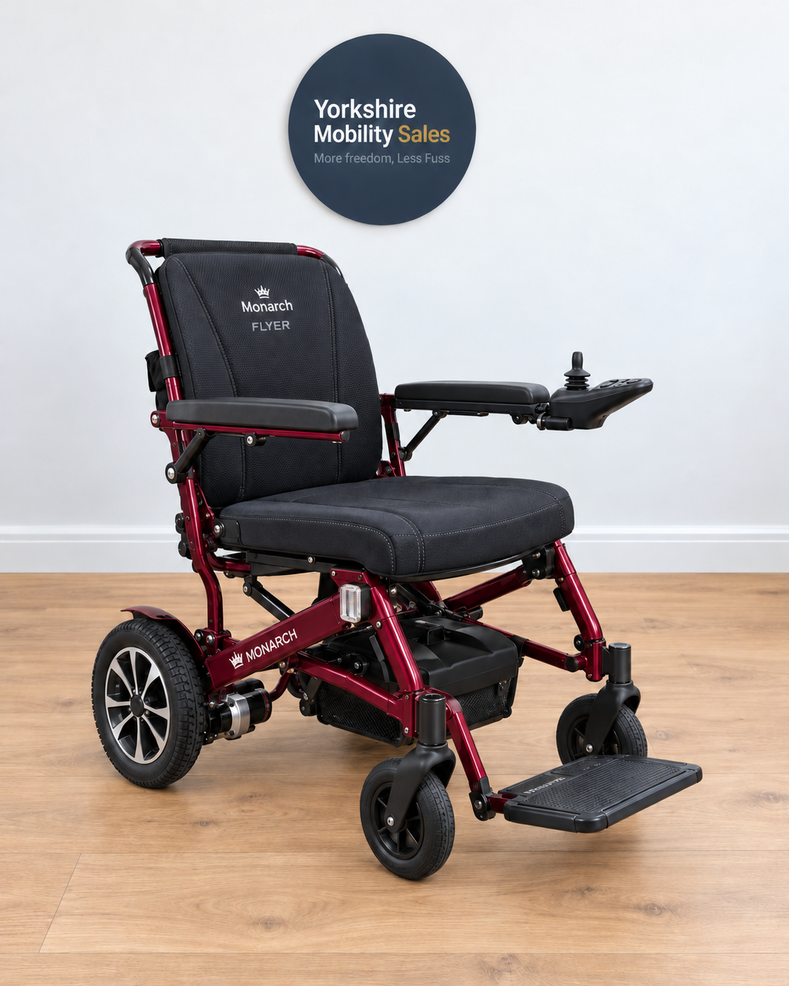 Monarch Flyer Powerchair in Merlot Red on Yorkshire Mobility Sales background