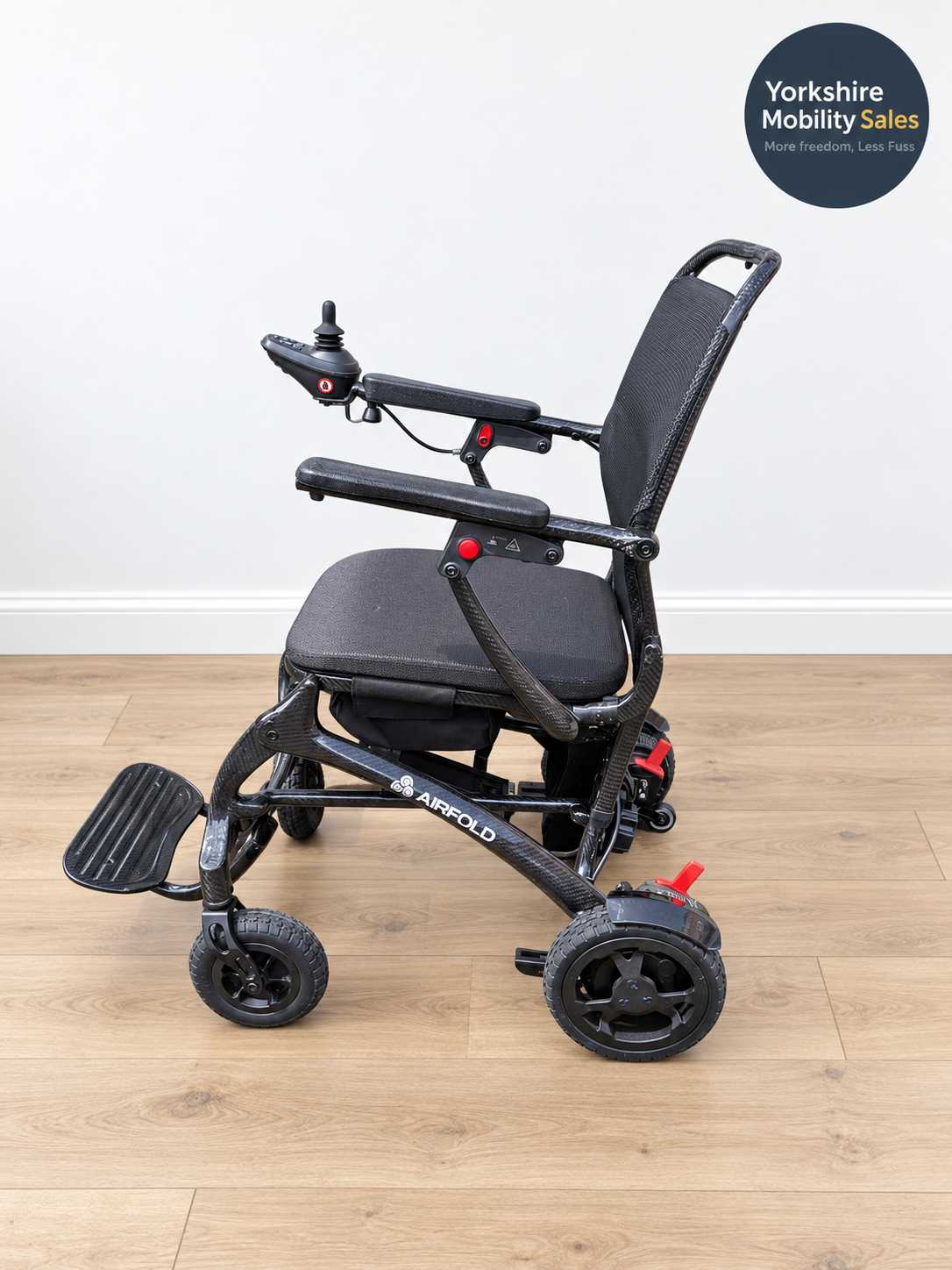 Preloved Drive AirFold carbon fibre powerchair – side view